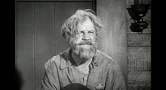 Douglas Fowley as the sheriff, demanding order in the court as McKane's trial begins in Raiders of Old California (1957)