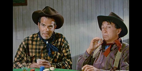 Douglas Kennedy as Harve Garrison and Paul Fix as Ray Cavanaugh, intrigued by news of a rancher's death in Ride the Man Down (1952)