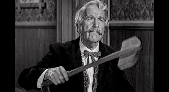 Douglas Wood as Judge Whipple, presiding over Bill Foster's sham murder trial in Cattle Queen (1953)