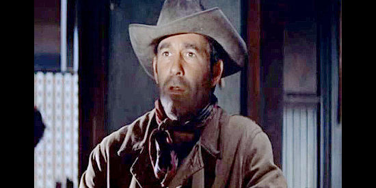 Eddie Firestone as Burke, a member of Hollister's gang in The Law and Jake Wade (1958)