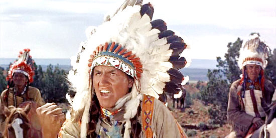 Eddie Little as Red Cloud, making demands of the southerners making their way to Texas in Revolt at Fort Laramie (1957)