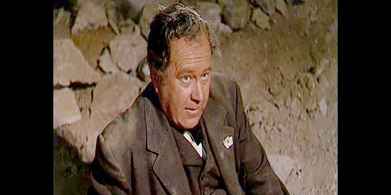 Edgar Buchanan as federal agent Dobbs, at Pete Carver's mercy after falling and injuring his leg in Cave of Outlaws (1951)