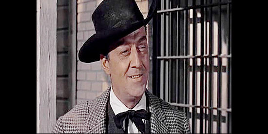 Edmon Ryan as William P. Selby, the attorney who arrives in Springdale to defend Eddie Campbell in Good Day for a Hanging (1959)
