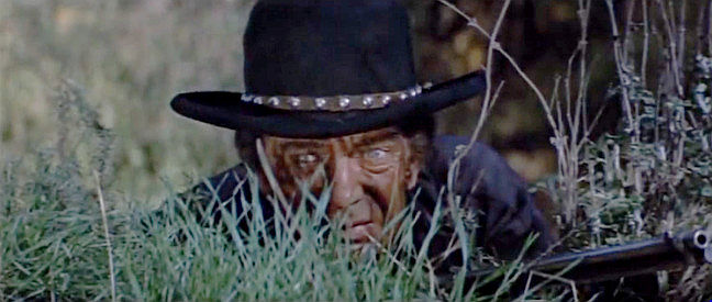 Eduard Franz as Jacob Lance, the half-breed tracker hired to find Trace Jordan in The Burning Hills (1956)