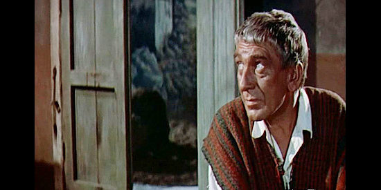 Eduard Franz as Padre Jose, the humble priest who agrees to help Brad Ellison on his mission in The Last of the Fast Guns (1958)