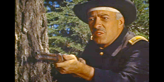 Edward Paltt as Col. Roland Dane, the headstrong new commander of the cavalry outpost in Oregon Passage (1958)