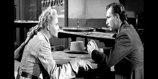 Elaine Aiken as Ada, trying to convince Faro (Lee Van Cleef) not to go up against Jacob Wade in The Lonely Man (1957)