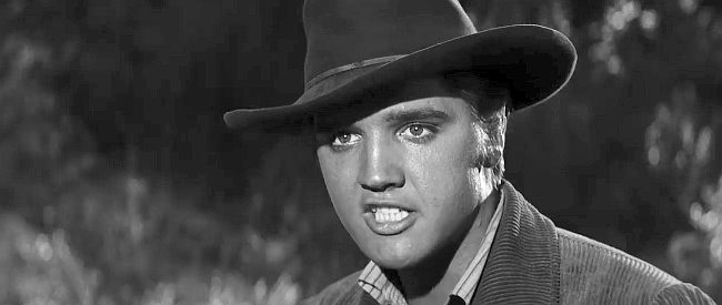 Elvis Presley as Clint Reno, flying into a jealous rage with wife Cathy in Love Me Tender (1956)