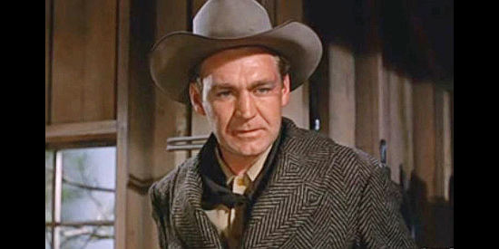 Forrest Tucker as Sam Danfelser, constantly fearing the woman he loves and the ranch he wants are clearing away in Ride the Man Down (1952)