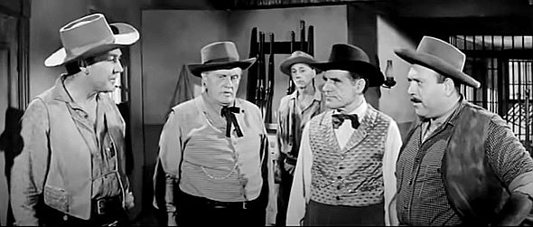 Forrest Tucker as Sheriff Carl Brandon scolding council members Frank Townsend (Gene Roth), Jackson McCready and Harold Lesser (Gerald Milton) in The Quiet Gun (1957)