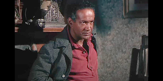 Frank Silvera as Stacey Marshall, a man who helps provide supplies to the Dalton gang in The Cimarron Kid (1952)