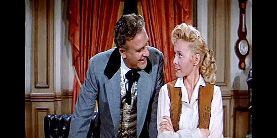 Frank Wilcox as Beau Santee, asking his lover Nancy Dawson (Randy Stuart) to get information from Dan Beattie in The Man from God's Country (1958)