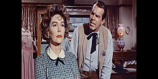 Fred MacMurray as Ben Cutler, arguing about his sense of duty with fiancee Ruth Granger (Margaret Hayes) in Good Day for a Hanging (1959)