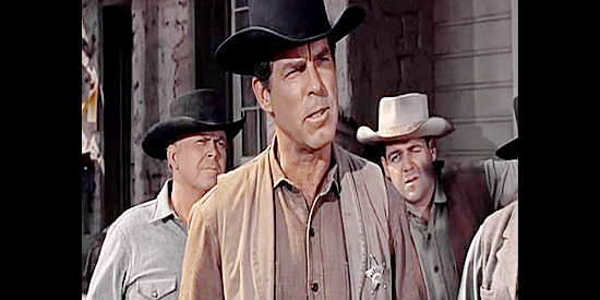 Fred MacMurray as Marshal Ben Cutler, accusing attorney Selby of tainting the jury pool in Good Day for a Hanging (1959)