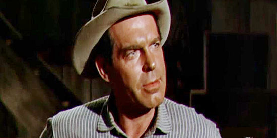 Fred MacMurray as Will Keough, forced to help raise his two brothers and build a profitable ranch in Gun for a Coward (1956)