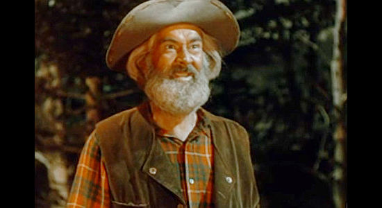 Gabby Hayes as 'Grizzly' Winters, the prospector who befriends Jim Redfern in The Cariboo Trail (1950)