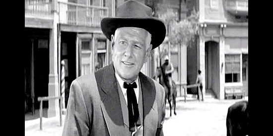 George Macready as Ed Sampson, the town boss determined to drive out the homesteaders in Plunderers of Painted Flats (1959)