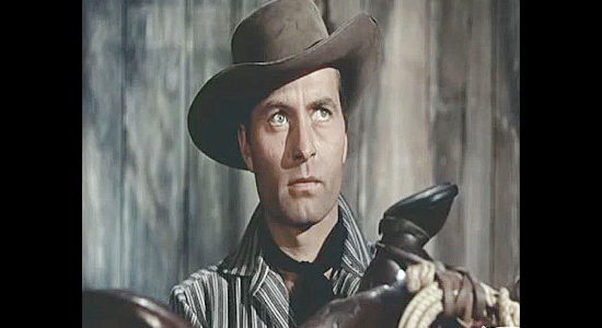 George Montgomery as Bret Ivers, working with the secret service to discover who's stealing ore shipments in Cripple Creek (1952)