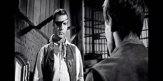 George Montgomery as Clay Morgan, confronted with an angry young man who once wanted to be his deputy in Black Patch (1957)