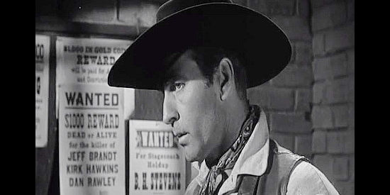 George Montgomery as Clay Morgan, wondering how to help the friend he's just locked in his jail in Black Patch (1957)