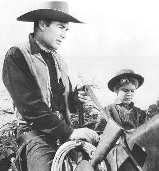 George Montgomery as Dan Beattie and Kim Charney as Stony Warren in Man ...