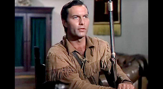 George Montgomery as Pathfinder, considering an offer to spy for the British after being offered a top notch interpretor to assist in The Pathfinder (1952)