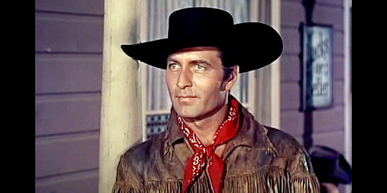 George Montgomery as Paul Fletcher, agreeing to lead the wagon train to Fort Baxter in Pawnee (1957)
