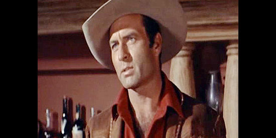 George Montgomery as Steve Patrick, about to hire a motley crew of cattle hands in Canyon River (1956)