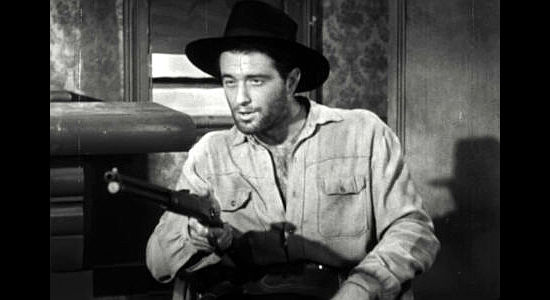 Gerald Frank as Crandall, one of Clellan's boys, guarding the prisoners in Seven Guns to Mesa (1958)