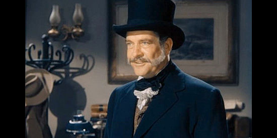 Grant Withers as David Strong, Constance's father, worried Loomis's plan will lead to financial ruin in Rock Island Trail (1950)