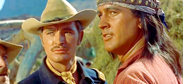 Gregg Palmer as Capt. Burnett and Rock Hudson as Taza, discussing how to best deal with Apache men who have broken the peace in Taza, Son of Cochise (1954)