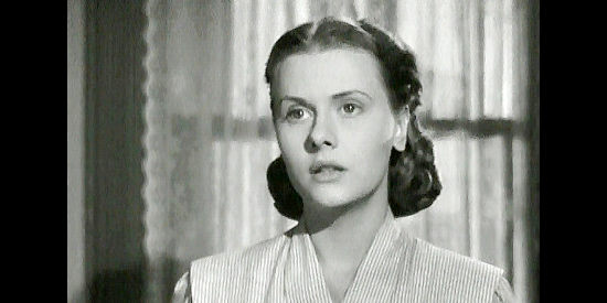 Helen Wescott as Peggy Walsh (aka Ringo), meeting with her estranged husband in The Gunfighter (1950)