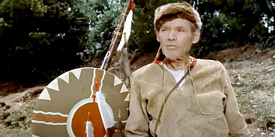 Henry Hull as George Seton, guide for the wagon train in The Oregon Trail (1959)