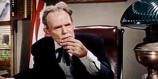 Henry Hull as Judge Morley, considering John Chandler's case in The Proud Rebel (1958)