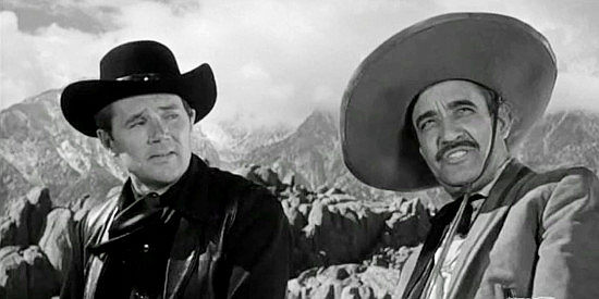 Howard Duff as Blackjack Ketchum, being guided to Horseshoe Valley by Jaime Brigo (Martin Garralaga) in Blackjack Ketchum, Desperado (1956)