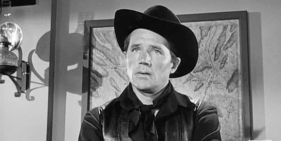 Howard Duff as Tom 'Blackjack' Ketchum, figuring out a way to deal with Jared Tetlow in Blackjack Ketchum, Desperado (1956)