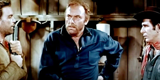 Howard Petrie as Butch Cassidy, learning the truth about the man calling himself Jeff Younger in The Maverick Queen (1956)