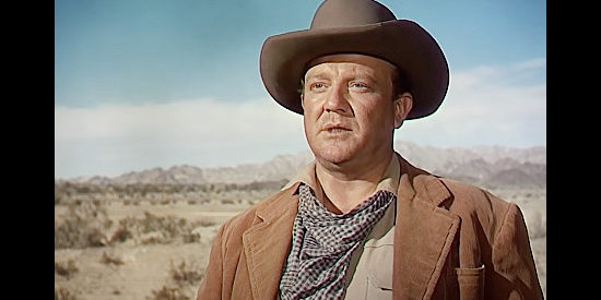 Hugh Sanders as Denver Kinnaird, the stranger found in the desert by Sgt. Trainor and his men in Last of the Comanches (1952)