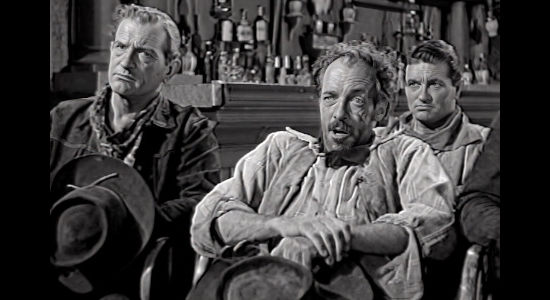 I. Stanford Jolley as Scarface, one of Duke Drake's henchmen, ready to pronounce Bill Foster guilty in Cattle Queen (1951)