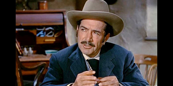 J. Carrol Naish as Sheriff Joe Keen, a lawman who tries to be fair despite expectations to the contrary in Ride the Man Down (1952)