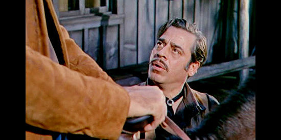 Jack La Rue as Wes Kennedy, denying any knowledge of John Evarts' death in Ride the Man Down (1952)