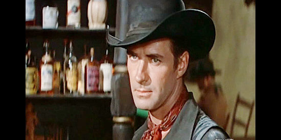 Jack Mahoney as Brad Ellison, heading south of the border to find a man's long-lost brother in The Last of the Fast Guns (1958)