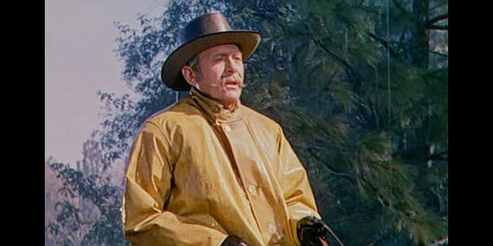 James Bell as John Evarts, warning Ray Cavanaugh about grazing his cows on Hatchet Ranch in Ride the Man Down (1952)