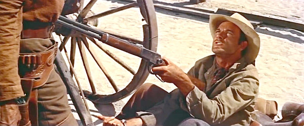James Best as Billy John, getting a gun on Ben Brigade, but it might not be loaded in Ride Lonesome (1959)