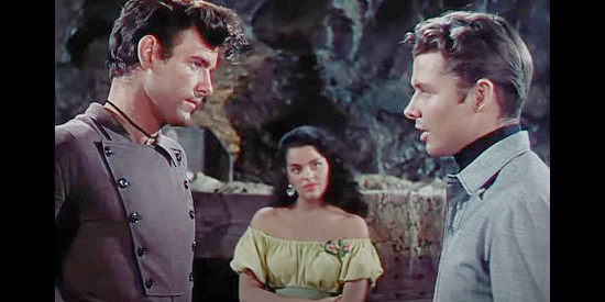 James Best as Bitter Creek and Audie Murphy as Bill Doolin, deciding Cimarron Rose should do some detective work in The Cimarron Kid (1952)