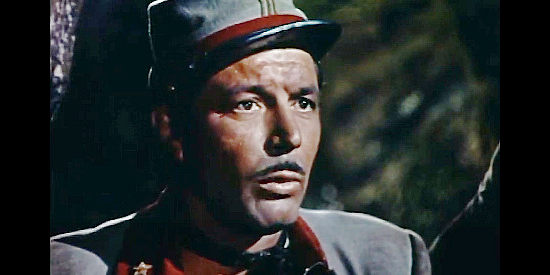 James Craig as Maj. Clay Clayburn, given the mission of interrupting the Union supply line in Drums in the Death South (1951)
