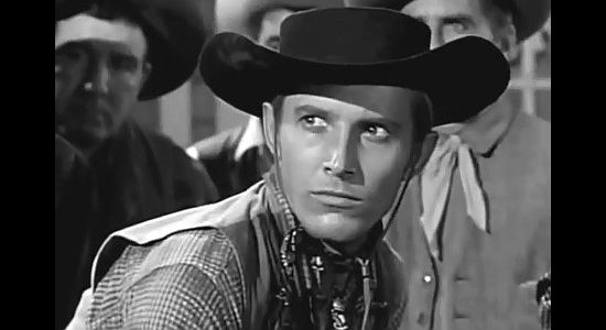 Jan Merlin as Viggo Tomlin, a gunman hired by the railroad to protect the farmers in The Peacemaker (1956)