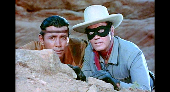 Jay Silverheels as Tonto and Clayton Moore as The Lone Ranger, doing their best to keep peace in The Lone Ranger (1956)