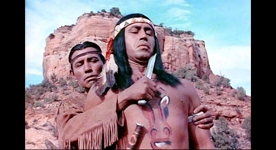 Jay Silverheels as Tonto with a knife to the throat of Angry Horse (Michael Ansara) in the Lone Ranger (1956)