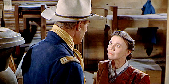 Jeanette Nolan as Charlotte Reynolds, blaming Benson for living while her husband died in Seventh Cavalry (1956)
